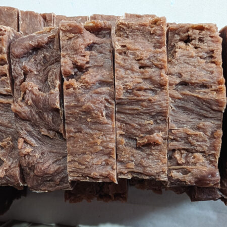 Top down photos of very ugly brown soap. The colour is okay, but there's no smoothness to the surface and I kind of hate them.