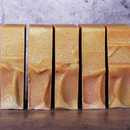 Bars of creamy soap, with enviroglitter on their top.